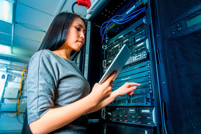 woman in computer datacenter